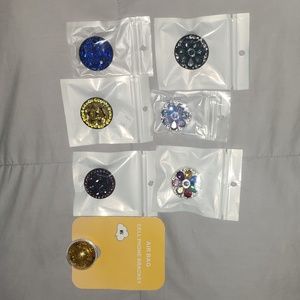 Popsockets, pick the one you like and send me a message